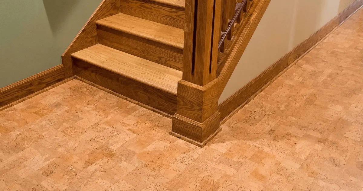 End of a staircase with cork flooring in Columbia, MO